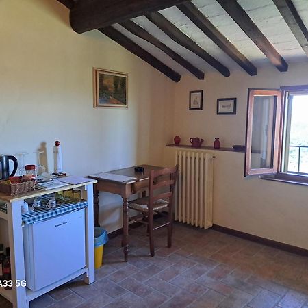 Podere Il Caggio Rooms ซานจีมิญญาโน ภายนอก รูปภาพ