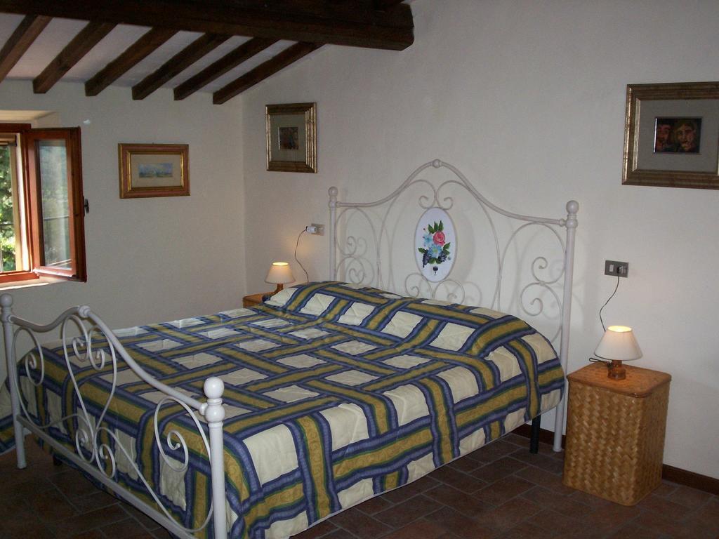 Podere Il Caggio Rooms ซานจีมิญญาโน ห้อง รูปภาพ