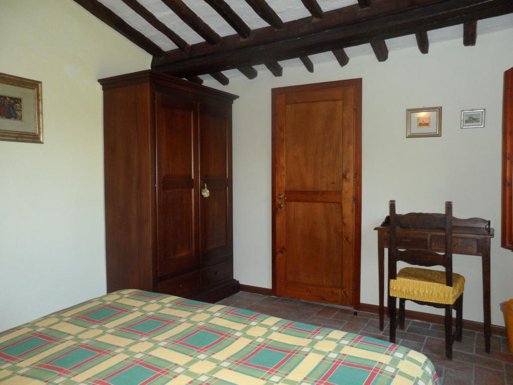 Podere Il Caggio Rooms ซานจีมิญญาโน ห้อง รูปภาพ