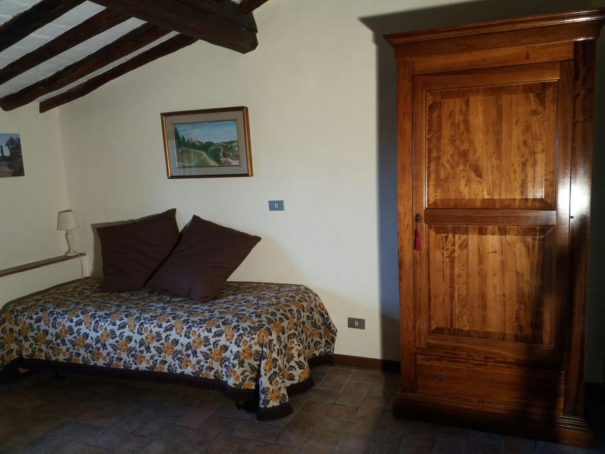 Podere Il Caggio Rooms ซานจีมิญญาโน ภายนอก รูปภาพ